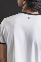 Baby tee REDENTOR Basic marfil/black – espalda con logo de la cabra