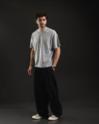 Look Boxy Block Gray de tres cuartos con pantalón negro ancho