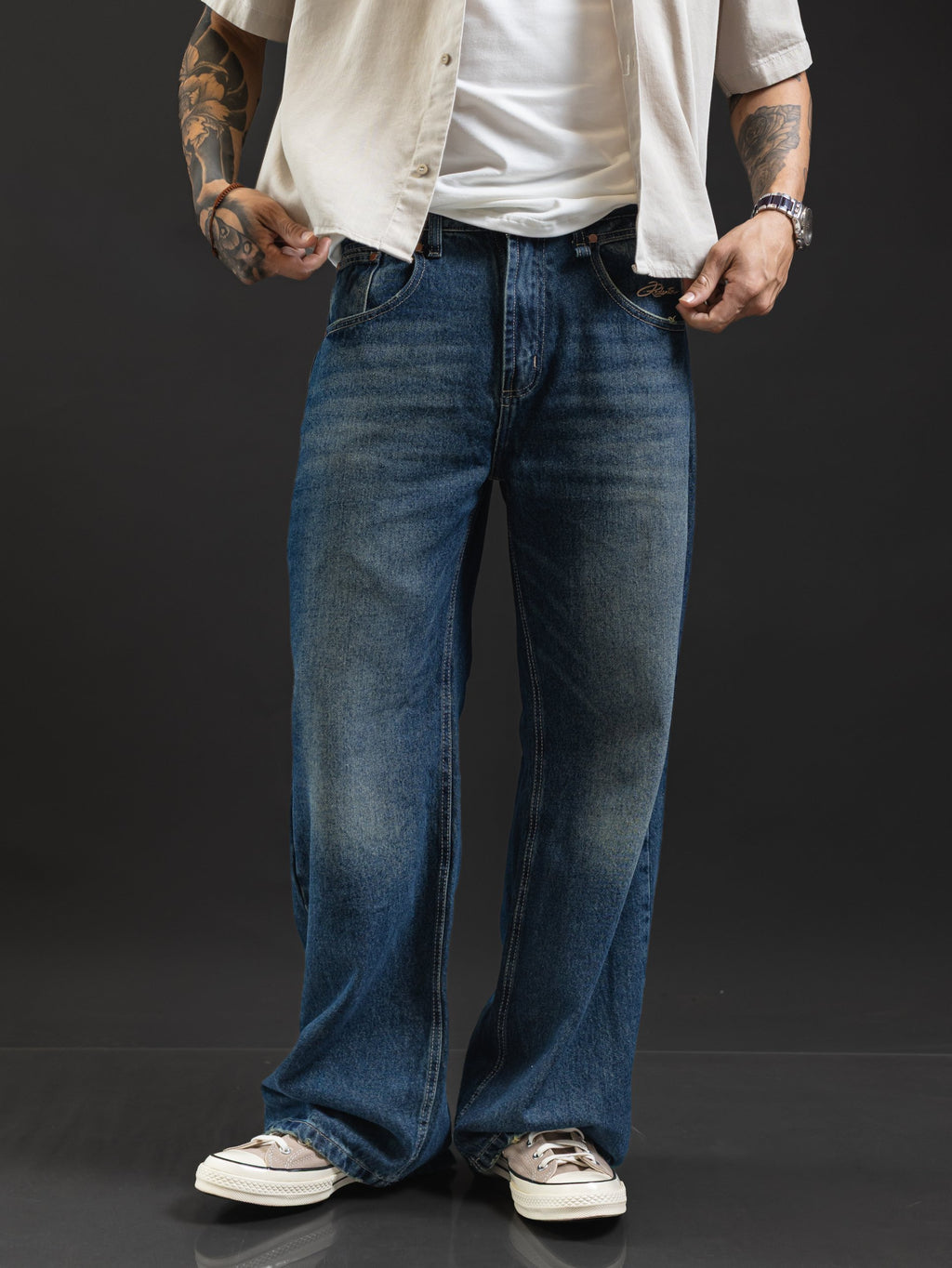 Jean REDENTOR Flare Azul Oxidado, frente con firma bordada