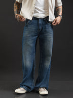 Jean REDENTOR Flare Azul Oxidado, frente con firma bordada