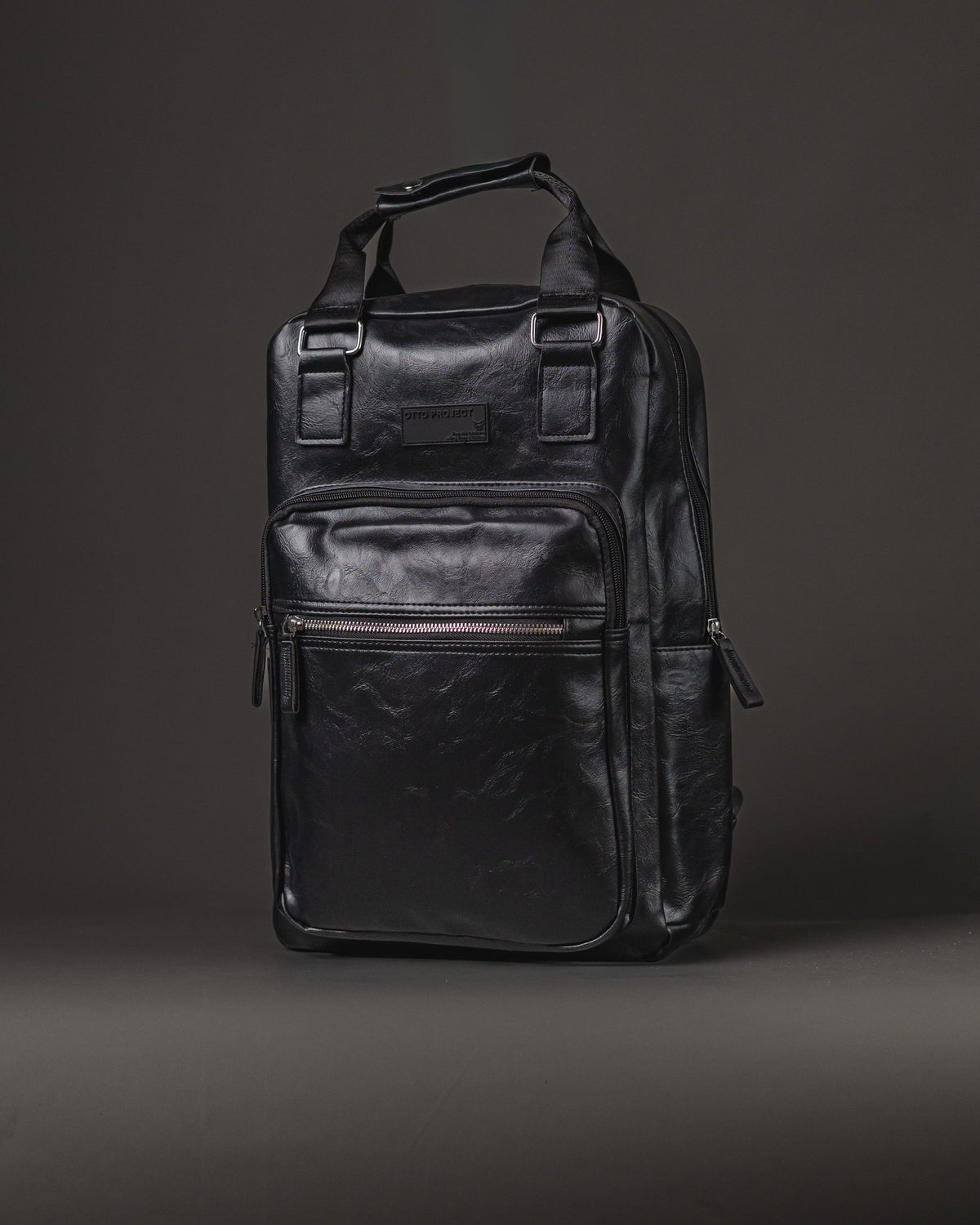 MOCHILA DE HOMBRE PU CON BOLSILLO EXTERIOR MANIJAS NEGRO
