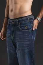 Pantalón baggy OTTO Blue Black - detalle de bordado y botones